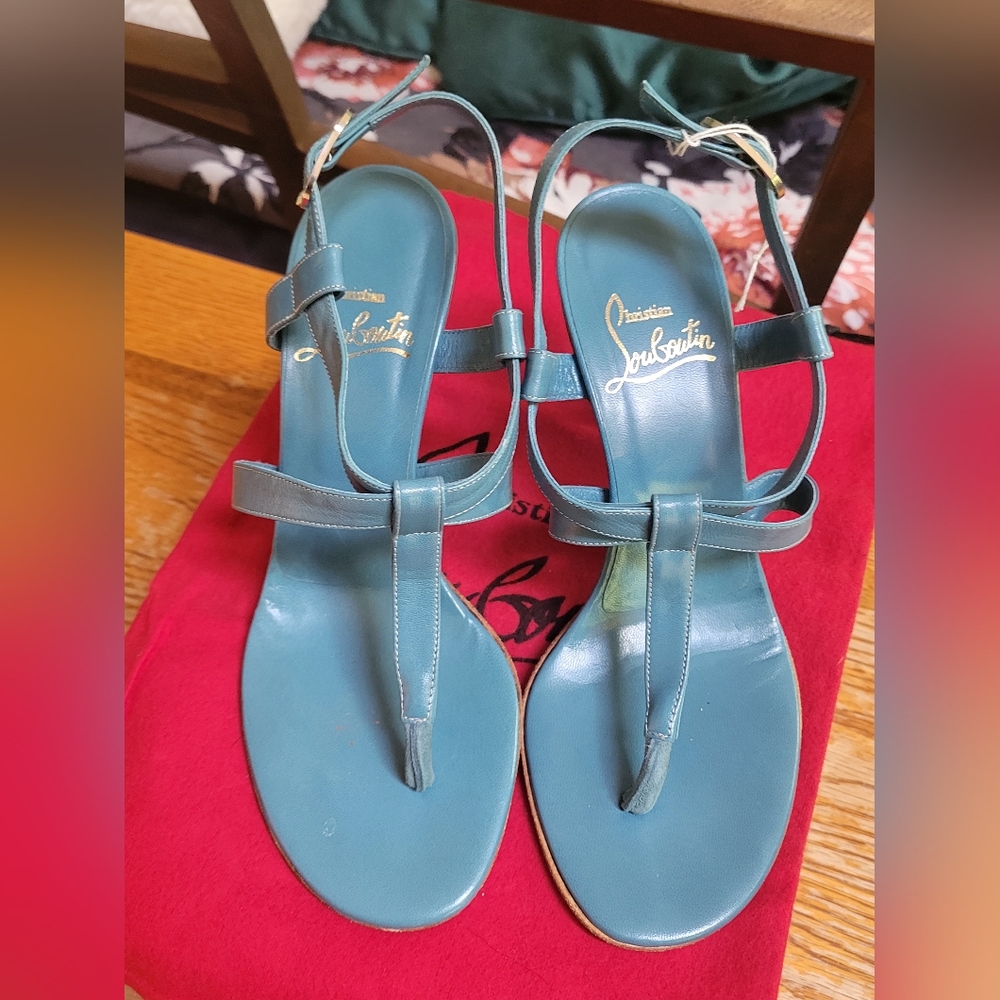 A pair of Christian Louboutin Light blue high heel sandals!